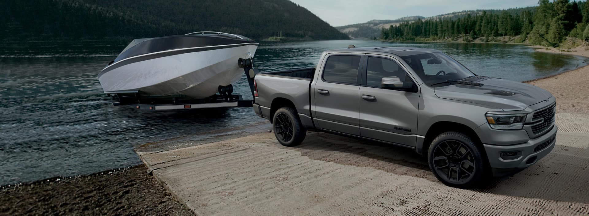 Dodge truck towing a boat out of the water