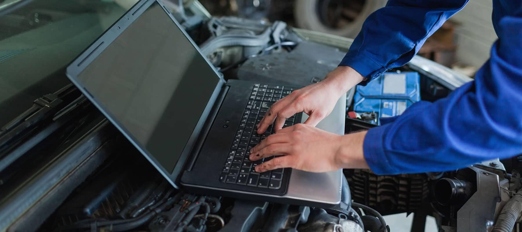 mechanic using a computer