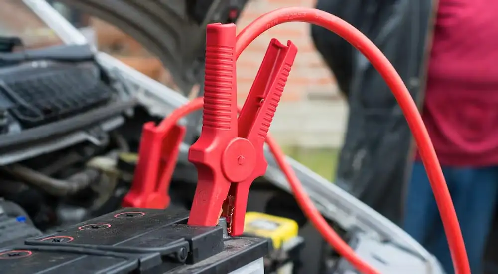 jumper cables charging car battery