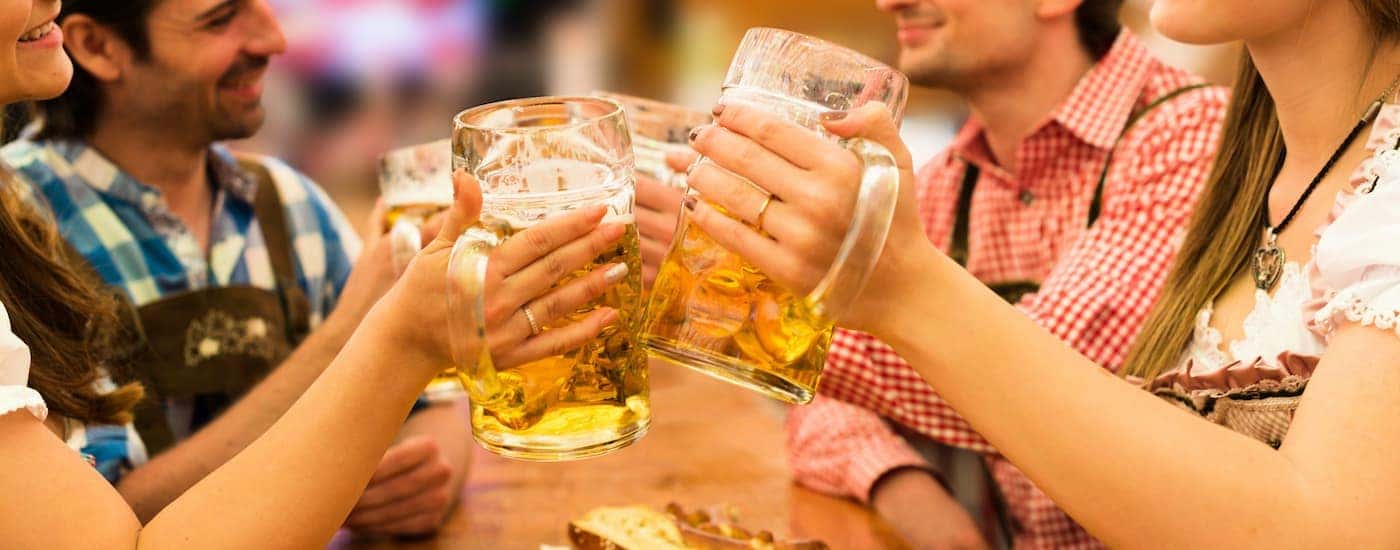Oktoberfest Beer mugs cheering