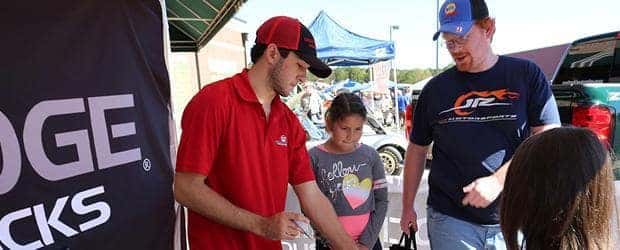 Rocky Ridge Trucks representative with crowd