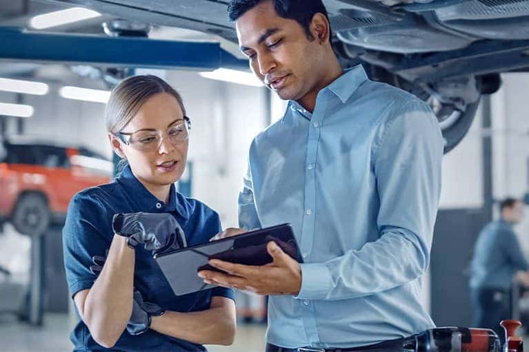 Two-mechanics-review-a-work-order-in-a-service-shop_mobile