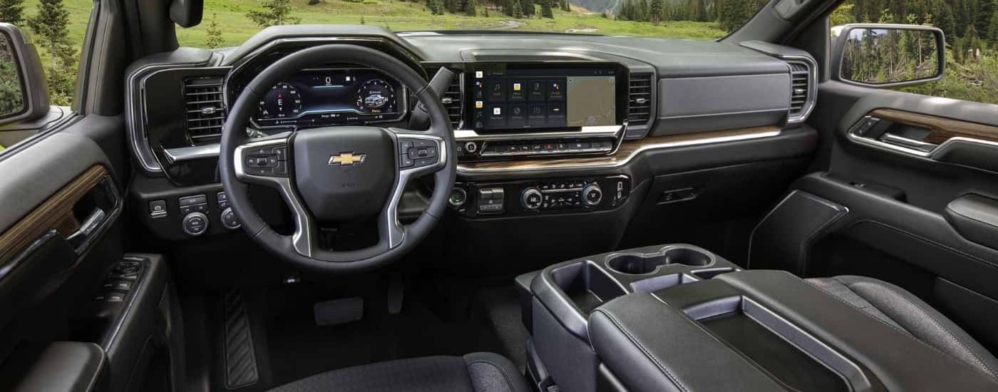 The black interior of a 2024 Chevy Silverado for sale near Haverhill is shown.