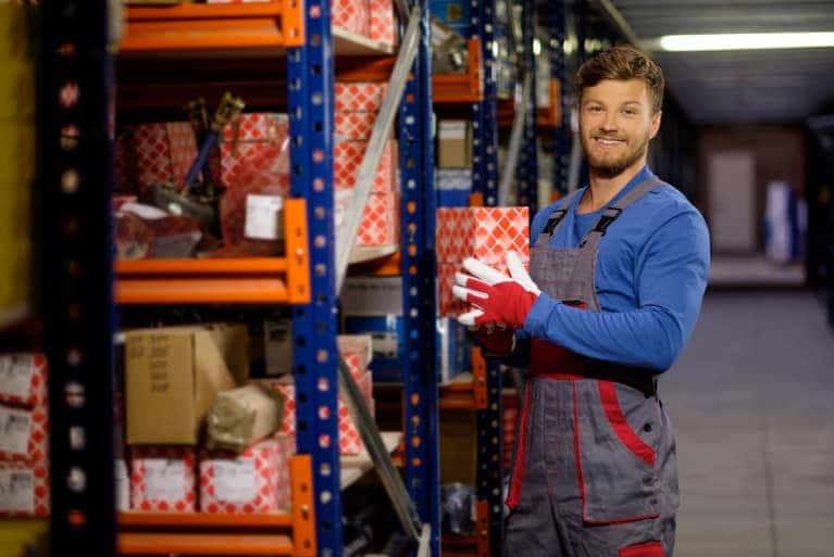 parts specialist holding parts