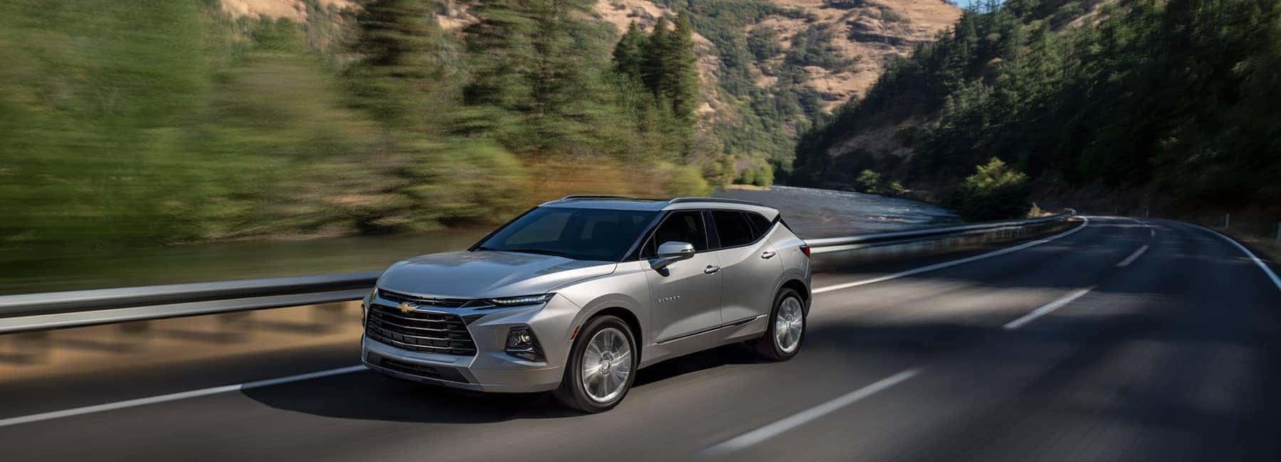 Silver 2020 Blazer Driving on a Mountain Rd_mobile