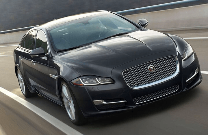 2018 Jaguar XJ seen from the front, driving on a curved road