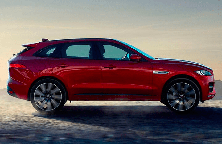 red 2017 Jaguar F-Pace lookin' gorgeous on the beach