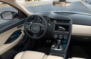 steering wheel and infotainment of the 2018 Jaguar F-PACE