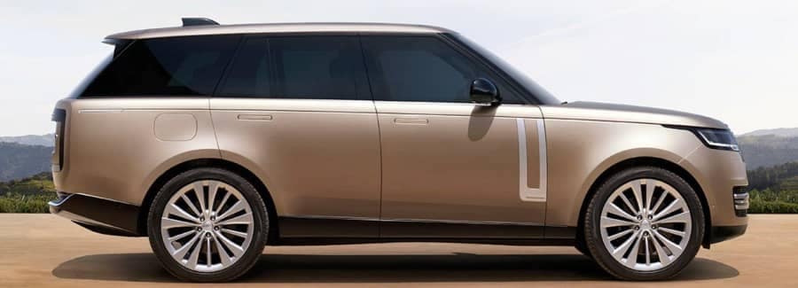 2022new-rangerover_sv-sideview-parked-gold
