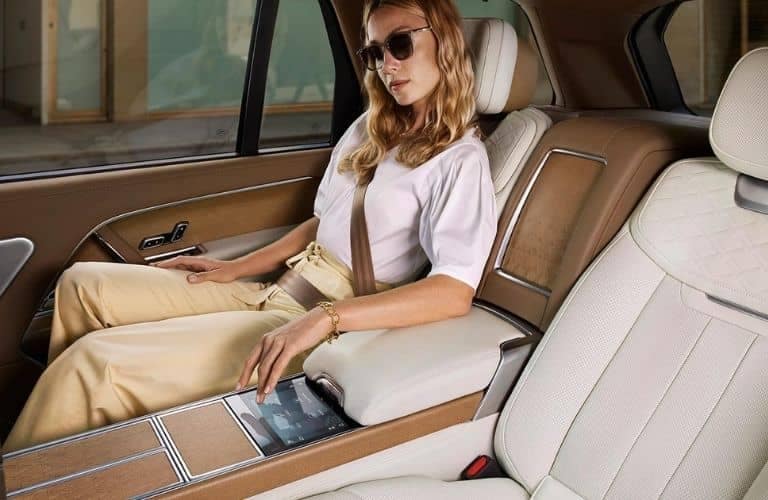Woman in Back Seat of 2023 Range Rover SV