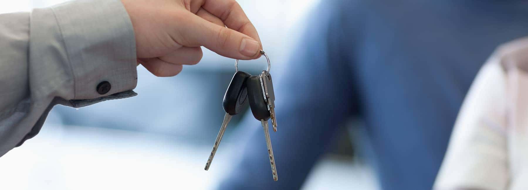 Salesman-hands-keys-to-couple