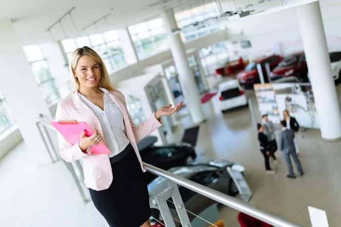 Saleswoman_In_Car_Showroom