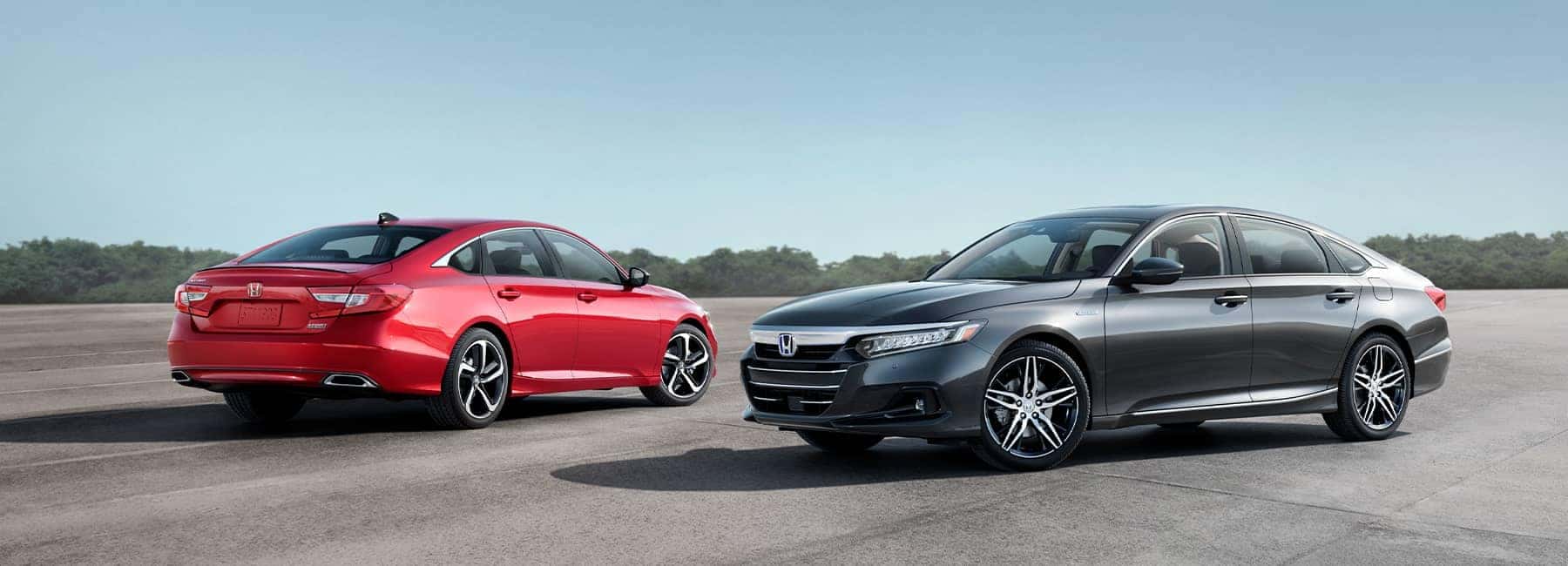 A Red and Grey 2021 Honda Accord parked next to each other