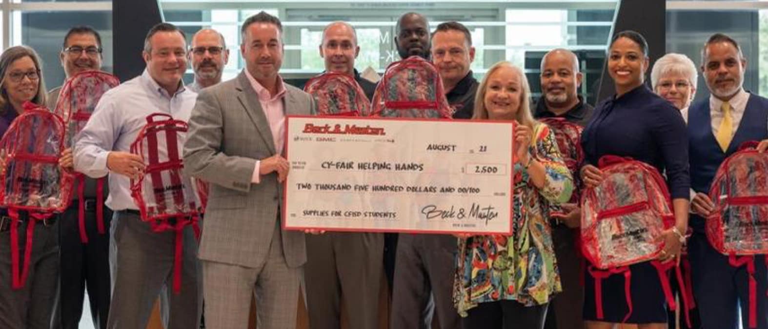 CY Fair Helping Hands group with big check