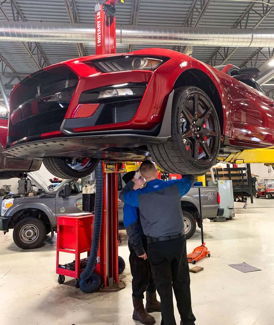 Bill Brown Service Employees working on vehicle