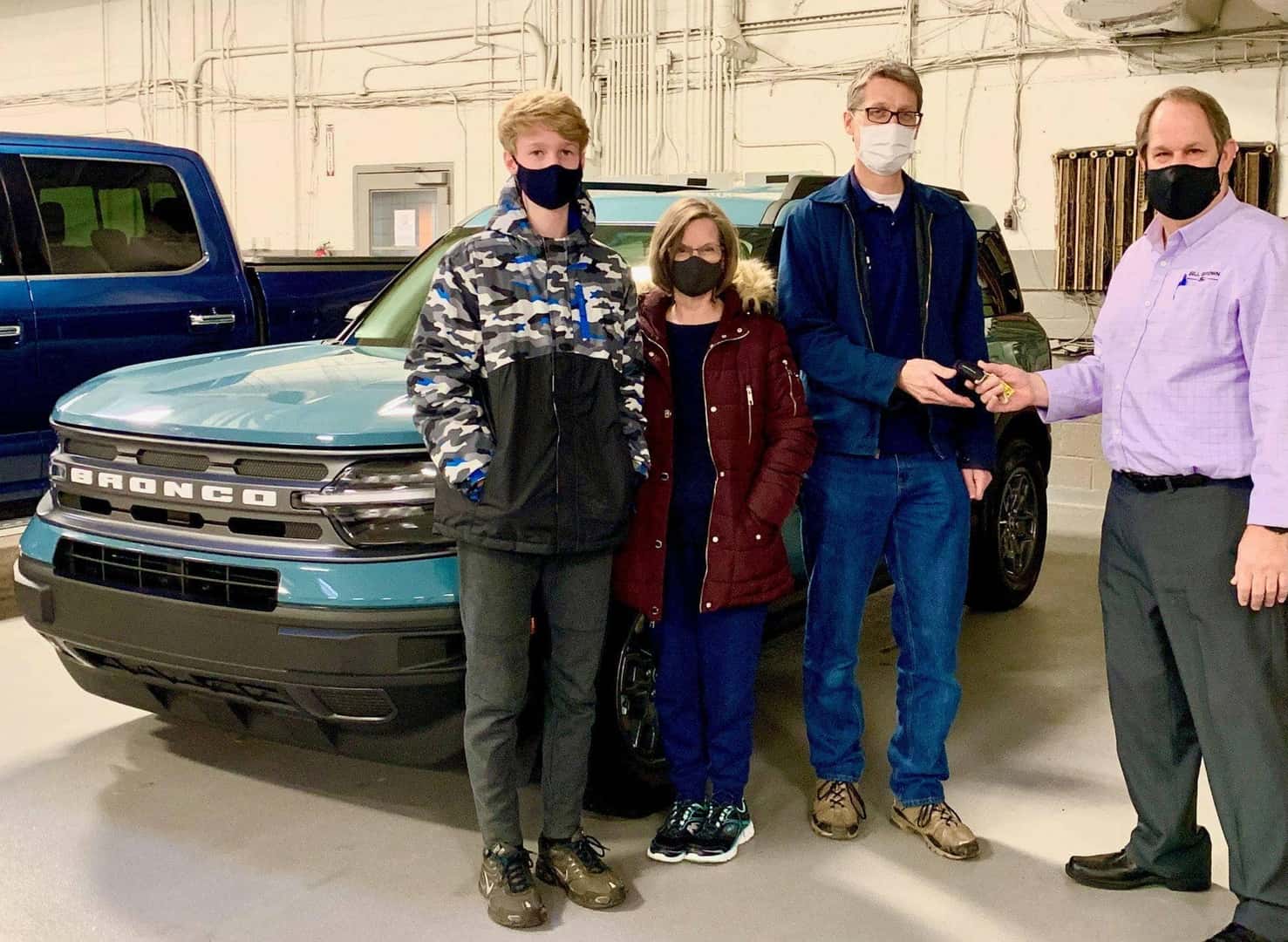 Customers in front of Bronco