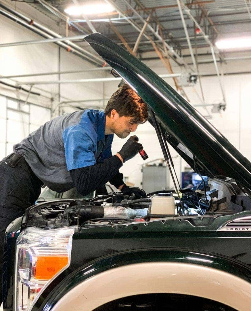 Bill Brown Technician working on car
