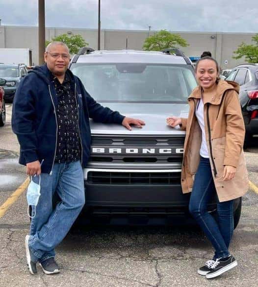 Customers in front of Bronco