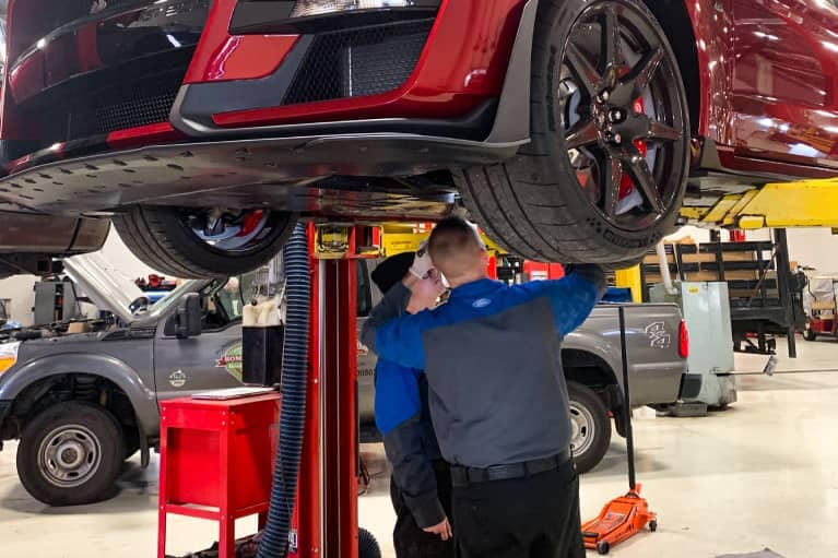 Bill Brown Ford Service Technicians working on Ford Vehicle near Northville, MI