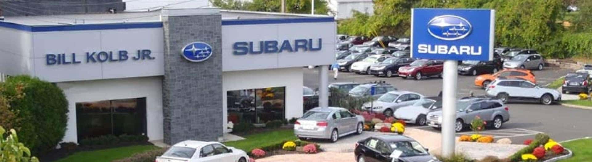 An exterior view of the top of a Subaru Dealership Building