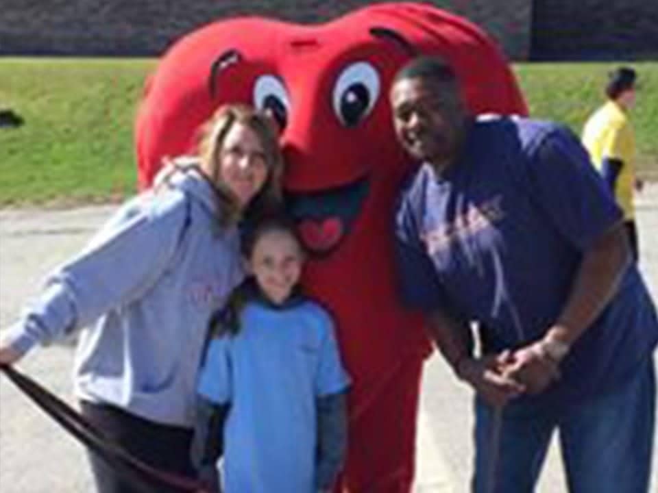 3 people with Heart Mascot