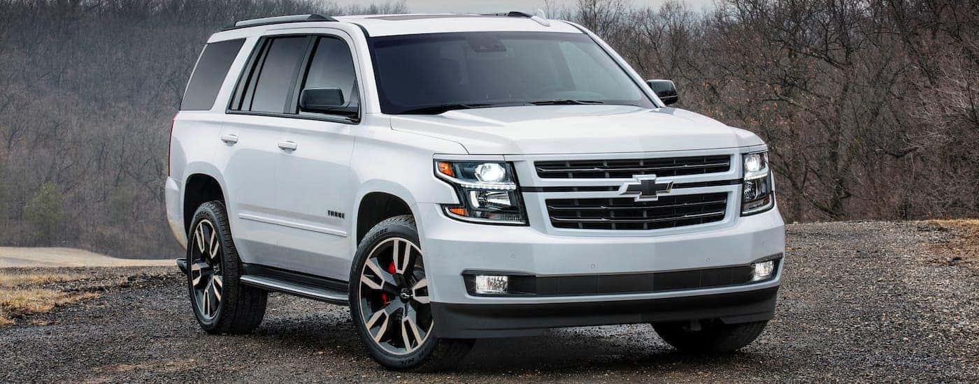 A white 2019 Chevy Tahoe RST with all the key features is parked on a gravel road in Indianapolis, IN.