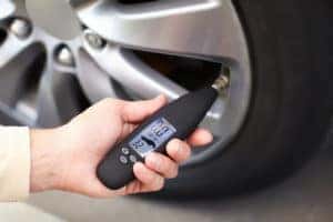 checking tire pressure