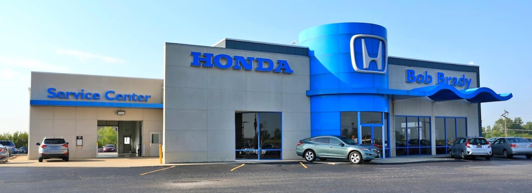 An exterior shot of a Honda dealership.