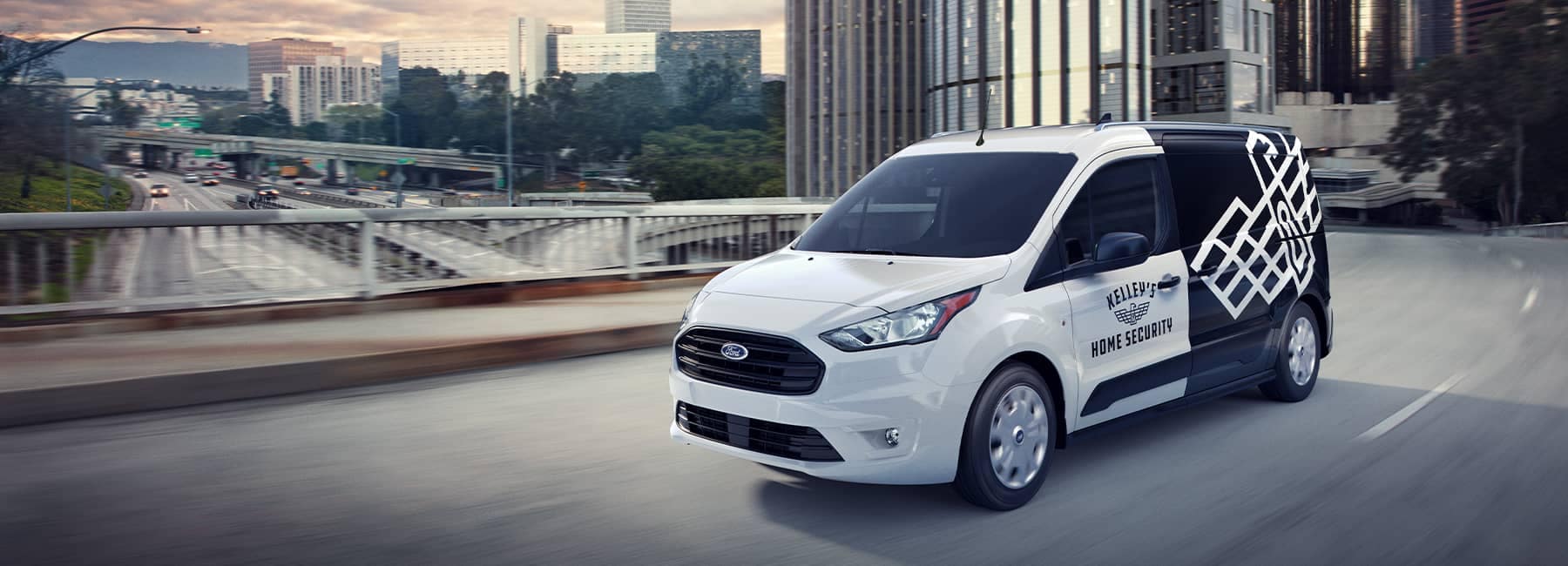 2021 Ford Transit driving through downtown