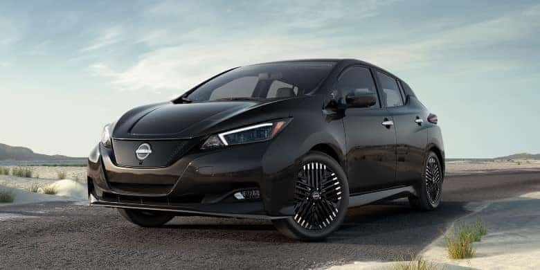 Front angled view of a black 2023 Nissan LEAF