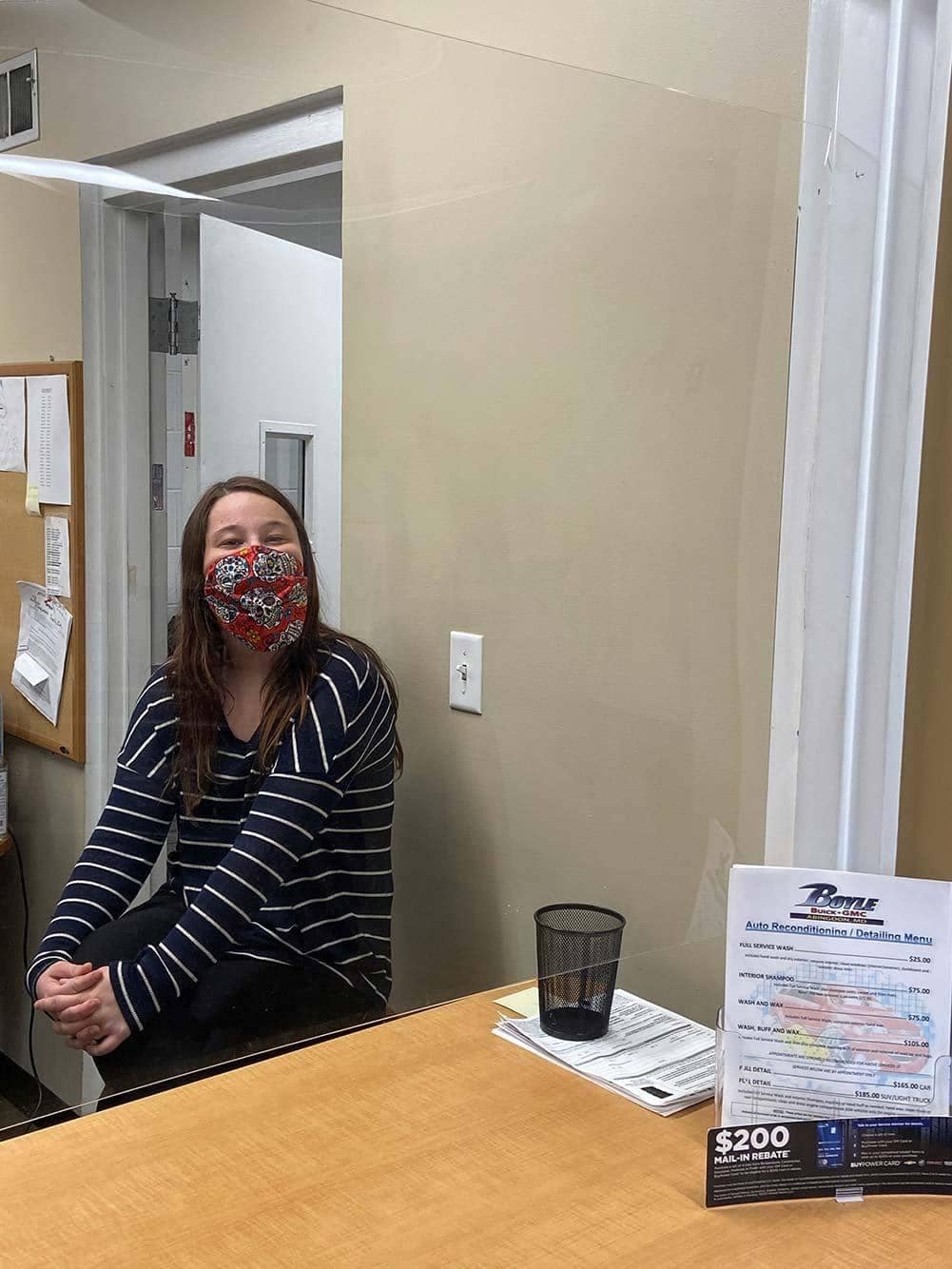 Dealership employee wearing mask