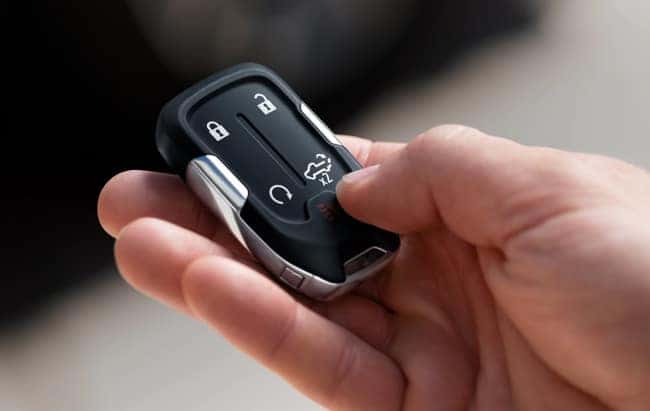 A man holding his car key