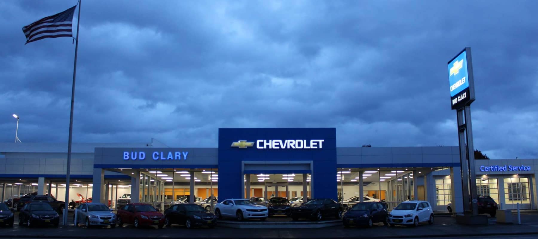 Bud Clary Chevrolet - Dealership exterior pictured at dusk