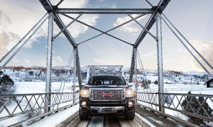GMC Denali crossing snowy bridge