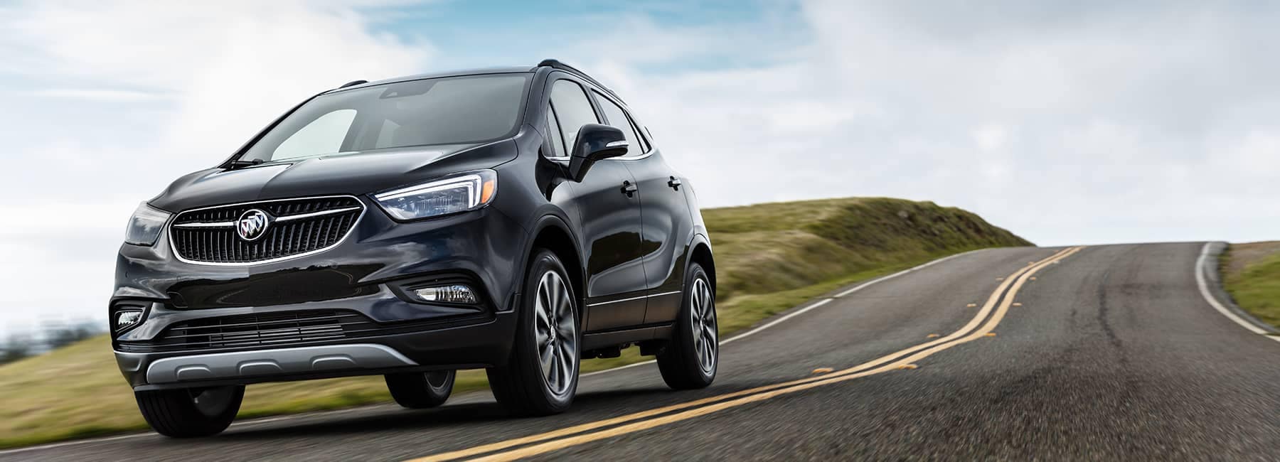 Black 2020 Buick Encore on a road_mobile