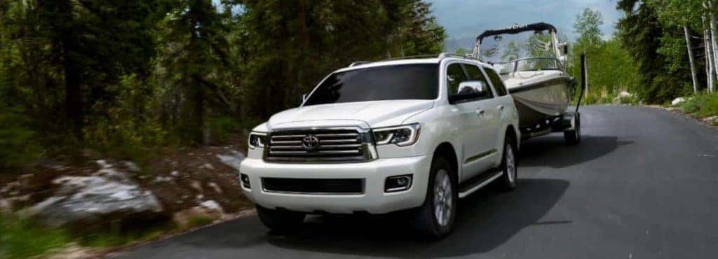 2022sequoia-front-3qview-pulling-boat-forestroad-white