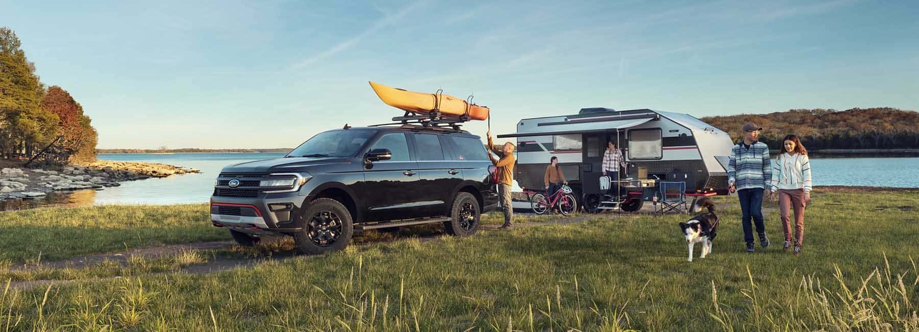 2023 Expedition with camper near lake
