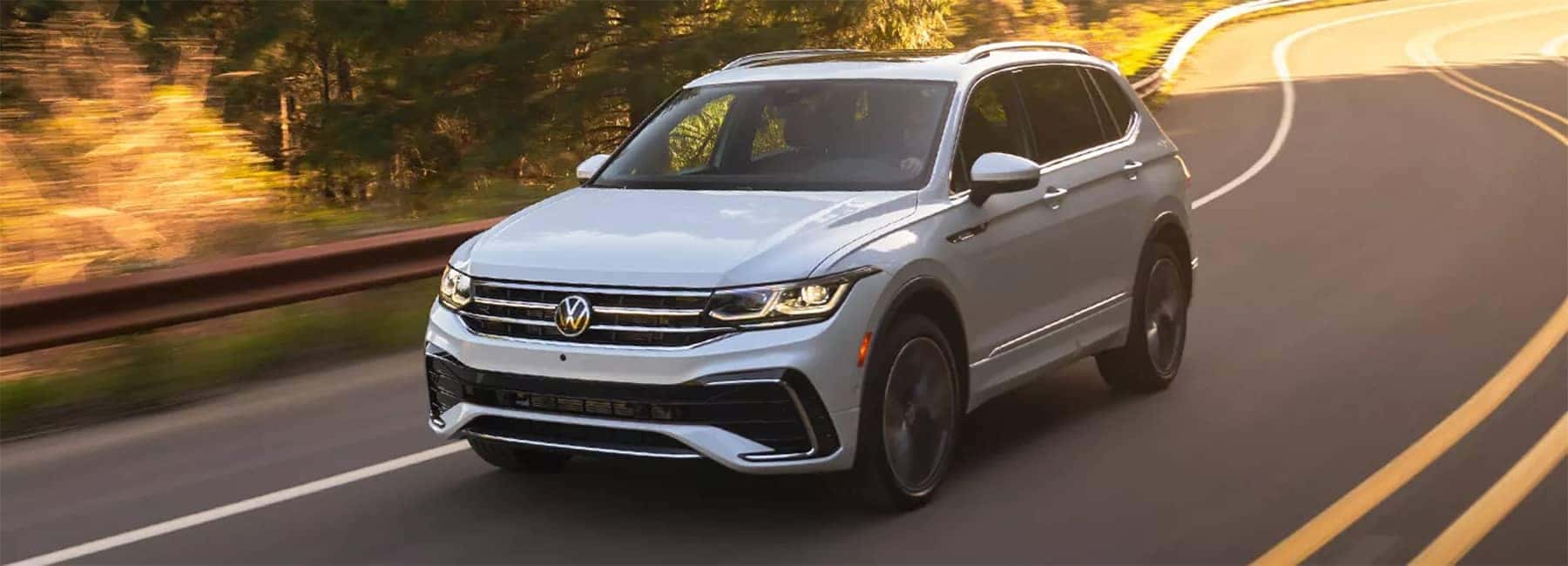 2023 VW Tiguan driving down windy road