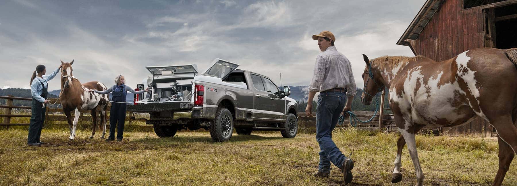 2023 Super Duty with people and horses around it
