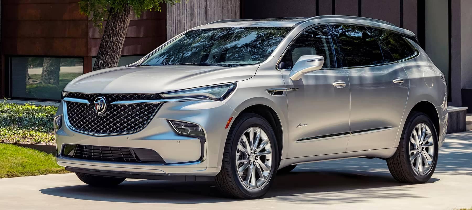 2023 Buick Enclave parked outside a home