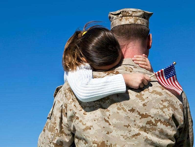 child hugging father