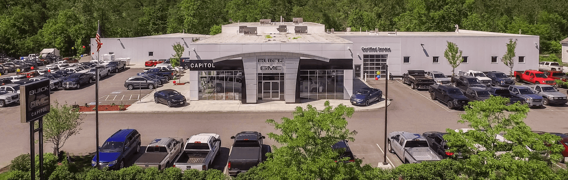 An exterior shot of a Buick GMC dealership.