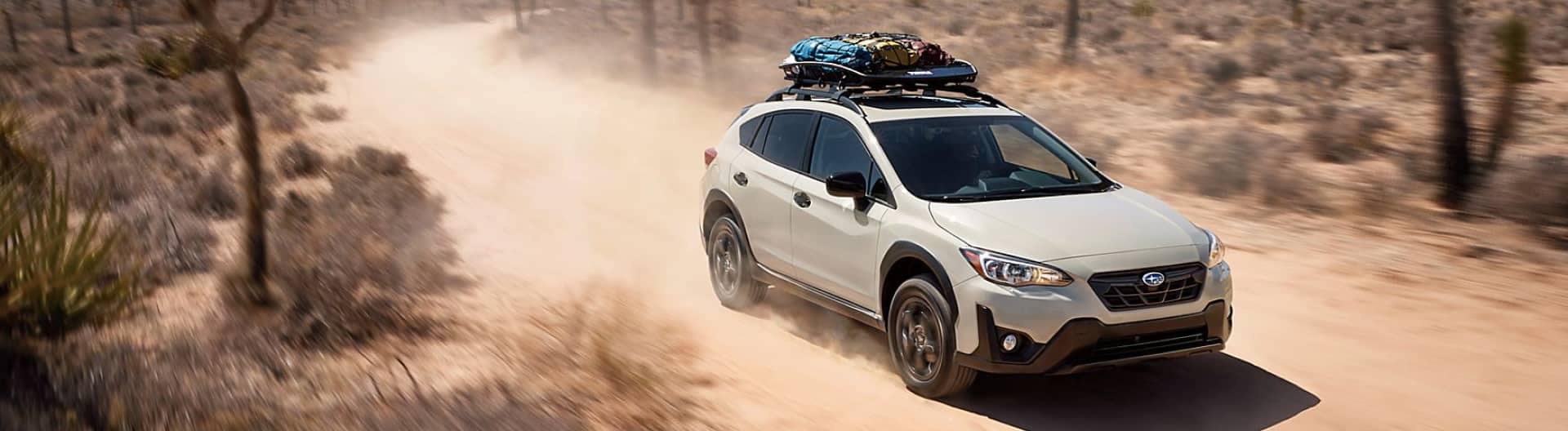 Subaru Crosstrek driving through the desert