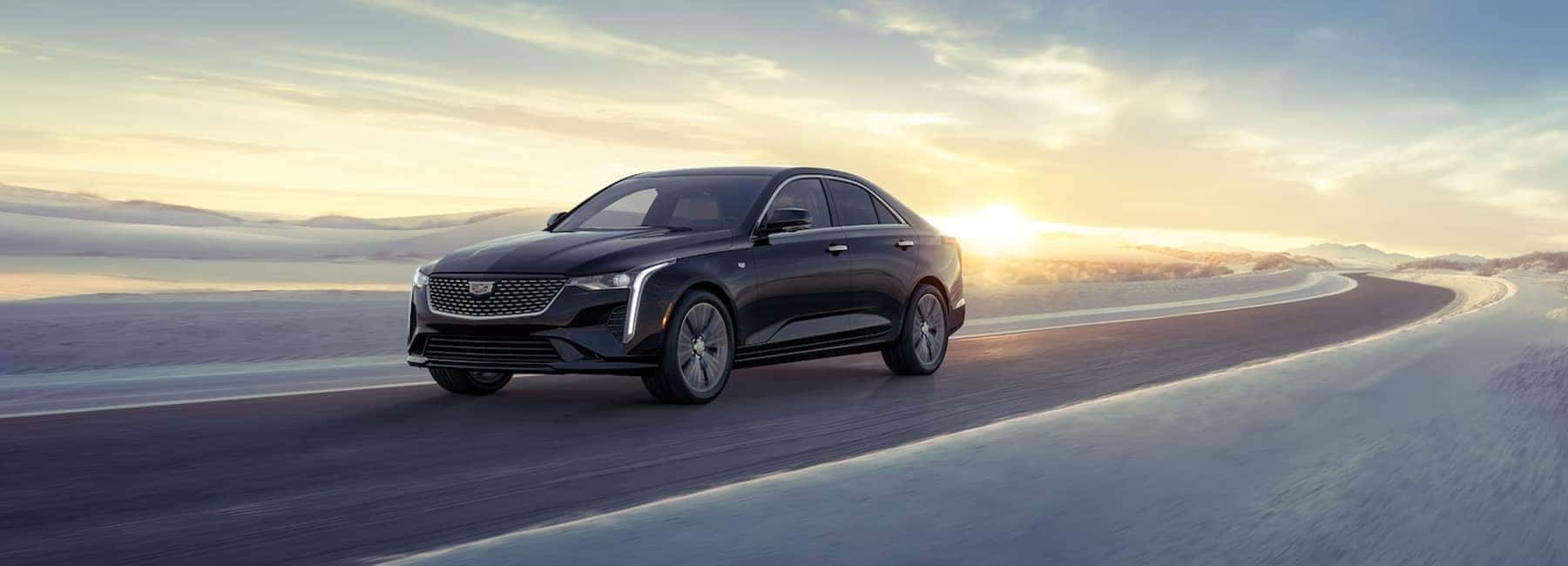 2023 CT4 driving down desert road -front view