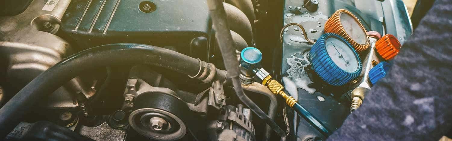 close up view of A/C repair work being done