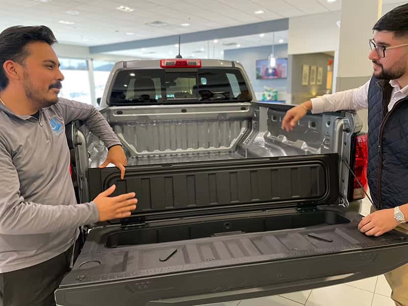 Lake-Auto-Group-rep-showing-truck-to-customer