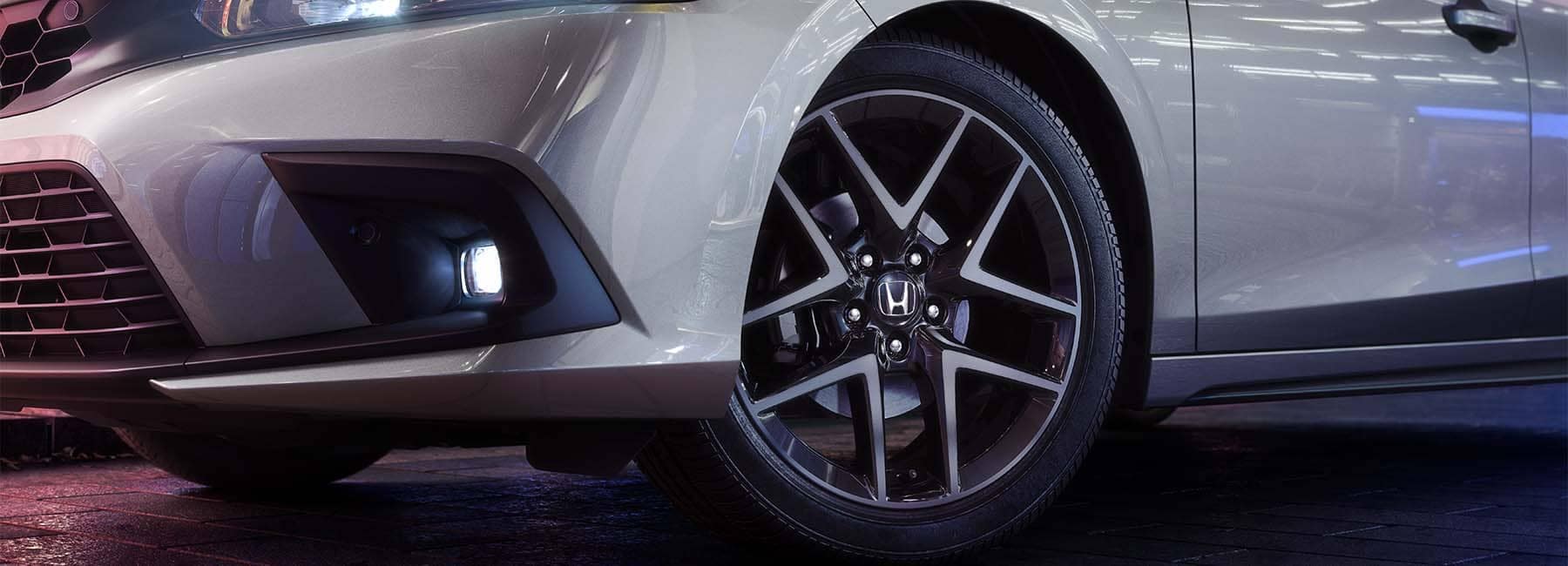 Closeup of a white 2022 Honda Civic wheel