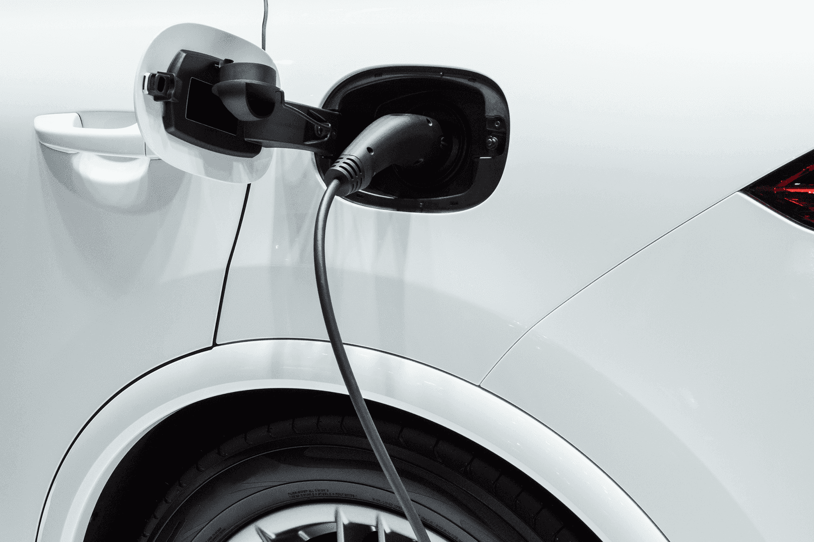 close up of white ev charging