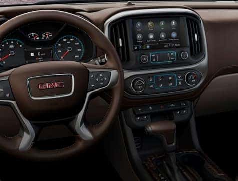 An interior shot of a GMC dashboard