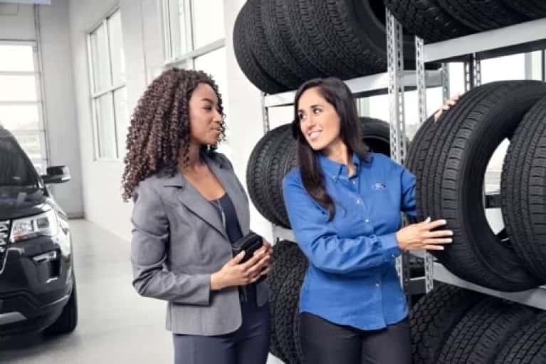 technician-shows-tire-options